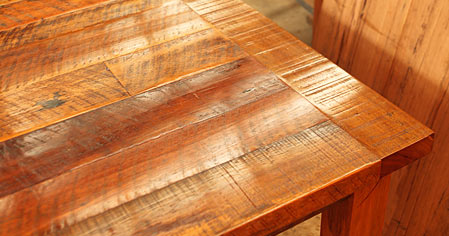 Old wooden tables warp when wet